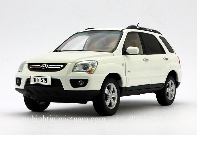 MÔ HÌNH Ô TÔ KIA SPORTAGE 2009 (TRẮNG) 1:18 DEALER