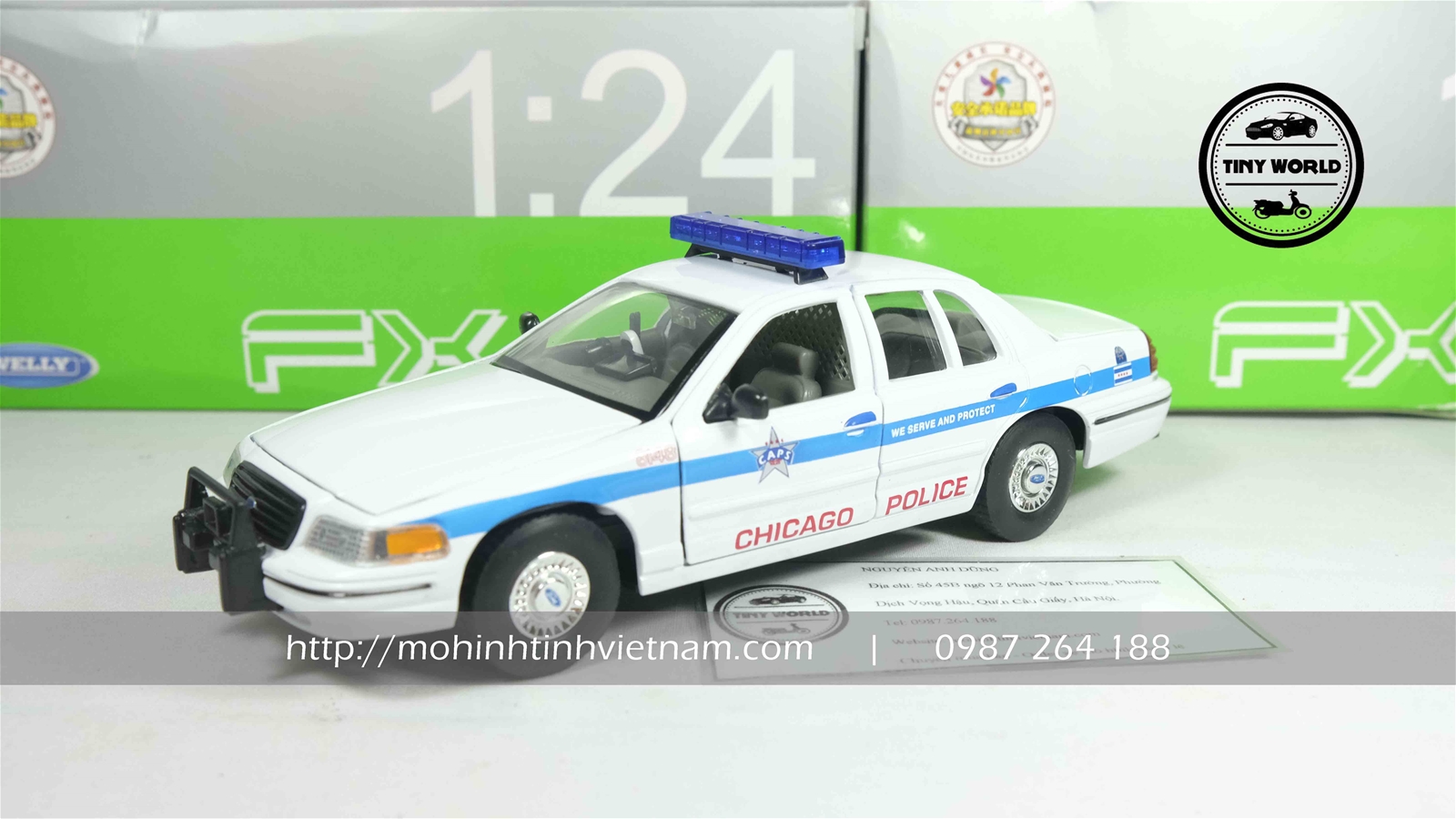 MÔ HÌNH Ô TÔ FORD CROWN VICTORIA CHICAGO POLICE 1999 (TRẮNG) 1:24 WELLY