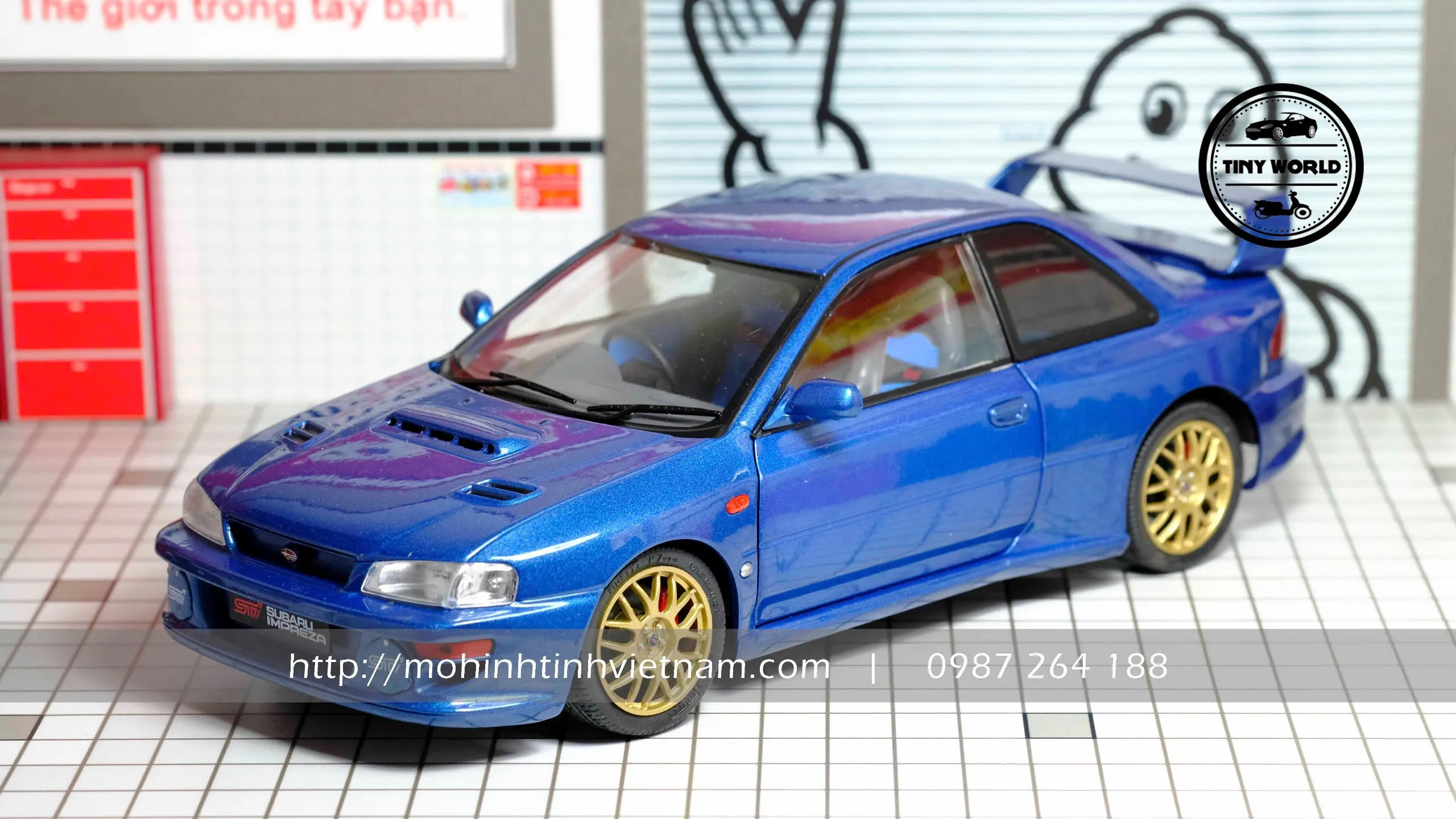 MÔ HÌNH Ô TÔ SUBARU IMPREZA 22B 1998 (XANH) 1:18 SOLIDO