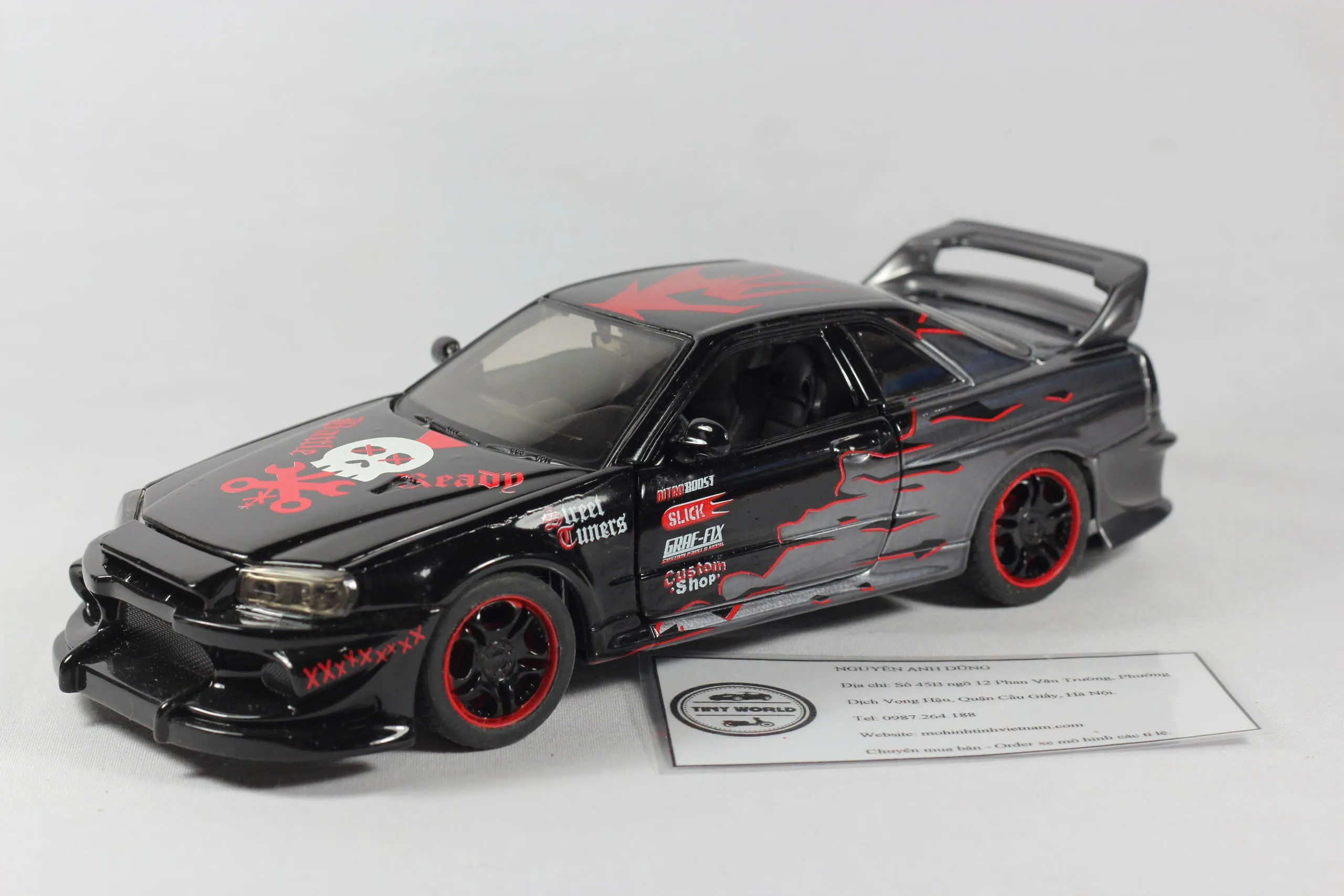 MÔ HÌNH Ô TÔ NISSAN SKYLINE GT-R R34 (ĐEN) 1:24 BBURAGO